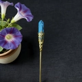 Detail of vintage gold filigree hair stick with blue hexagonal turquoise stone inlay - Turquoise