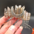 Detailed macro shot of a silver Wicca hair comb with brown natural crystal points and moon - Brown Gray With Moon