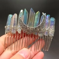 Detailed close-up of the rainbow crystal stones and vintage silver moon on the bridal hair comb - Grey With Moon