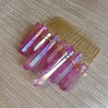 Detailed close-up of handmade purple crystal points wired onto a golden hair comb - Purple Aura (15)