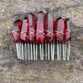Macro detail of raw red crystal pillars hand-wrapped with silver wire on a metal hair comb - Dark Red (17)