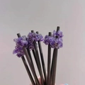 Detail of natural amethyst stone hair pins featuring rustic wrapped crystal clusters - Amethyst
