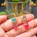 Detail of bohemian hoop earrings with multicolor crystal pendants and gold wire wrap - Red Blue and Gold Hoop