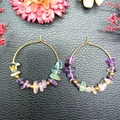 Detailed close-up of golden hoop earrings featuring multi-color natural raw crystal stones - Fluorite (Gold Hoop+Gold Bead) / Green Gold