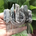 Detailed view of handmade crystal hair comb with raw labradortite and silver moon detail - Labradorite