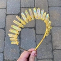 Macro view of aura quartz crystal crown with gold wire wrap on thin headband - Aura Yellow Crystal (Gold Wire)