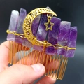 Macro detail of natural purple crystal hair comb with gold moon and star wire-wrapped charms - Amethyst Gold Wire Hair Comb