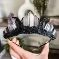 Gothic crown headpiece featuring natural white crystals and a black crescent moon emblem - White And Black Crystal Moon Style