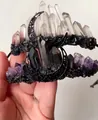 Detailed view of Gothic quartz crowns featuring raw crystals and ornate black crescent moon - White Crystal Black Ore Base Moon Style