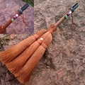 Macro detail of wicca witch broom pendant with crystal stones and wooden handle - Plated Black Crystal With Mixed Gemstone Beads
