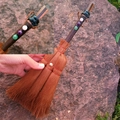 Detailed close-up of a Wiccan mini broom with crystal accents and dark wood handle - Plated Tawny Crystal With Mixed Gemstone Beads