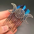 Detail of silver goddess hair comb with lunar symbols and purple crystal clusters - Dark Blue (10-Tooth)