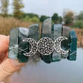 Macro detail of moss agate hair clip with silver triple moon goddess symbol in nature - Moss Agate & Triple Moon
