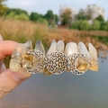 Detail of bohemian crystal moon hair clip with raw citrine stones and silver wire wrap - Citrine & Triple Moon