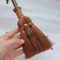 Macro shot of handcrafted wicca broomstick with sun charm and crystal bead decoration - Sun Smile Face Style (06)