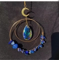 Detail of moon-shaped wind chime with amethyst stones and teardrop crystal pendant - Lapis Lazuli Chips + Raindrop Crystal
