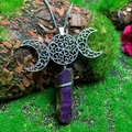 Macro shot of silver triple moon pendant with purple crystal on mossy wood background - Natural / Triple Moon Dark Purple Crystal Necklace