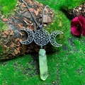 Macro detail of triple goddess moon pendant with green crystal column on tree bark - Natural / Triple Moon Yellow Crystal Necklace