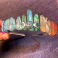 Close-up of handmade rainbow crystal crown with silver crescent moon and pentagram symbols - Small Triple Moon Style