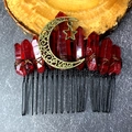 Macro detail of red crystal moon hair comb with gothic bronze star charms - Deep Red Crystal With Antique Bronze Star Moon