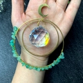 Handmade crystal wind chime with green gemstones, moon pendant and golden metal rings - Green Aventurine
