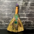 Detail of amethyst altar broom with tree of life metal charm and peacock feathers - Amethyst Tree of Life with Top Crystal
