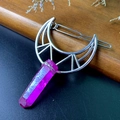 Detailed view of silver crescent moon hair clip with purple crystal on wood background - Hollow Barrette / Purple