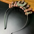 Detail of handmade crown headband with natural rose quartz stones and silver moon charm - Rhodochrosite Hollow Moon Style