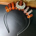 Detail of silver crown headband featuring rectangular orange stones and a crescent ornament - Red Agate Hollow Moon Style