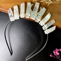 Detailed view of handmade crystal headband with silver moon pendant and natural white stones - Rose Quartz Hollow Moon Style
