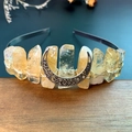 Close-up of handmade citrine crystal crown with vintage silver moon and wire wrapping - Citrine + Moon