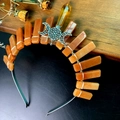 Macro shot of boho crystal headband with orange stones and silver triple moon charm - Red Aventurine + Triple Moon Crown