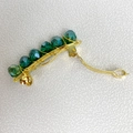 Detail of a gold alloy brooch with six green faceted crystals on a textured white surface - 4cm / Dark Green Gold Clip