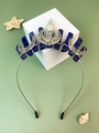 Detail of bohemian crown featuring raw blue crystals, silver moons, and pearl accents - Lapis Lazuli