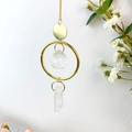 Hanging crystal suncatcher with natural raw stone and golden metal chain for home decor - White Crystal