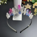 Detail of bohemian black moon crown with gradient raw crystals and silver wire wrap - Blue Red and White Mixed Color