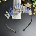 Detail of moon crystal headband with raw stones and silver crescent on black wire frame - Pink, Blue and White Mixed Color