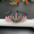 Detail of pink crystal pillars and silver moon wire-wrapped on a bohemian headband - Pink