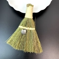 Detailed macro view of natural straw mini broom ornament with a silver shell charm detail - Silver Metal Shell Style (33)