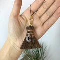 Detailed view of handmade mini broom pendant with silver star moon charm and copper wire - Broom with Star and Moon
