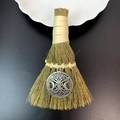 Close-up of small decorative witch broom with silver pentagram pendant on black background - Triple Goddess Pentagram Style (27)