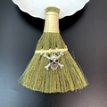 Detail of a mini straw broom with silver skull charm for Halloween decorations - Skull and Crossbones Style (15)