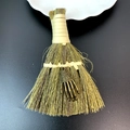 Close-up of Halloween mini straw broom featuring a vintage bronze skeleton hand charm - Skeleton Hand Claw Style (17)