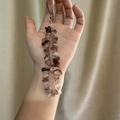 Handmade phone strap with natural smoky quartz chips and a black cord attachment - Super Seven