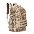 Macro view of digital desert camouflage tactical backpack with MOLLE system webbing - Desert Digital