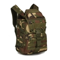Detail view of the MOLLE webbing system and durable camo nylon on the tactical backpack - 36-55L / Jungle Camouflage