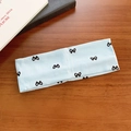 Bandeau en tricot bleu clair avec imprimé nœud noir et texture côtelée élastique - Bleu