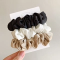 Dreiteiliges Set aus Satin-Haargummis in Schwarz, Weiß und Braun auf Displaykarte - Schwarz Weiß Und Kaffee