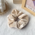 Minimalist beige velvet scrunchie in premium silk-like fabric for French hair styling - Champagne