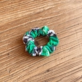 Minimalist fabric scrunchie with green and black football patterns on wooden background - Geometric Floral (20#)